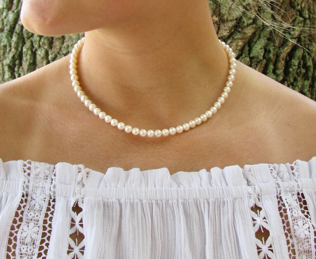 Single strand pearl best sale necklace