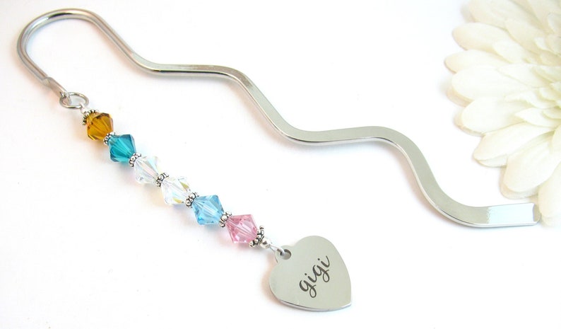 Custom Birthstone Bookmark:  Each Swarovski 8mm crystal represents a grandchild or child's birthstone (up to 9 crystals). Choose one charm.  They are attached to a 6" silver plated bookmark.