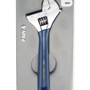 May include: A blue adjustable wrench with a silver jaw featuring a metric scale from 0 to 20 mm. The tool is housed in a grey moulded tray with the text PAW-6 printed on the left side and the number 8 displayed in the top right corner.