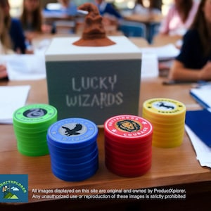 May include: A stack of colourful game tokens with different symbols and text, including "Sorting Hat", "Courage", and "Wit & Wisdom". The tokens are on a wooden table with a box that says "Lucky Wizards" on it.