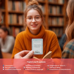 May include: A person holds a card with text, "Which moment left you with a sense of Incompleteness?" The card is held in front of a person wearing an orange sweater. The image is in a library setting. The card is part of a set of cards with topics to explore.