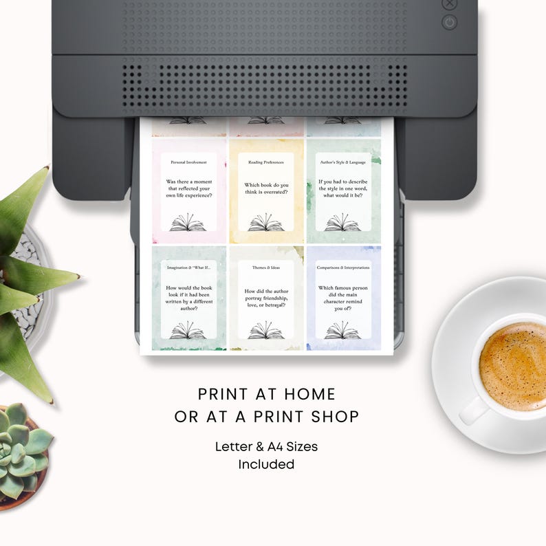 May include: A printer is shown printing colorful cards with book-themed graphics and text. The cards feature questions about books and reading. The text on the cards includes "Print at Home or at a Print Shop" and "Letter & A4 Sizes Included."