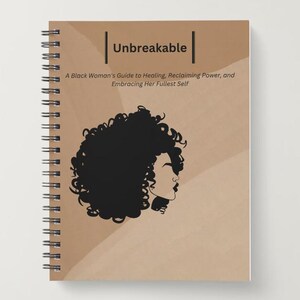 May include: A spiral bound journal with a brown cover featuring a black silhouette of a woman with curly hair. The title "Unbreakable" is printed in white on the cover, along with the text "A Black Woman's Guide to Healing, Reclaiming Power, and Embracing Her Fullest Self."