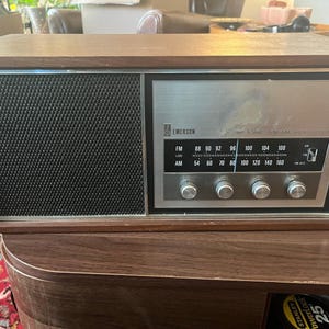 vintage Emerson Model 31T56 radio, a solid-state AM/FM tuner in a wood cab. image 1