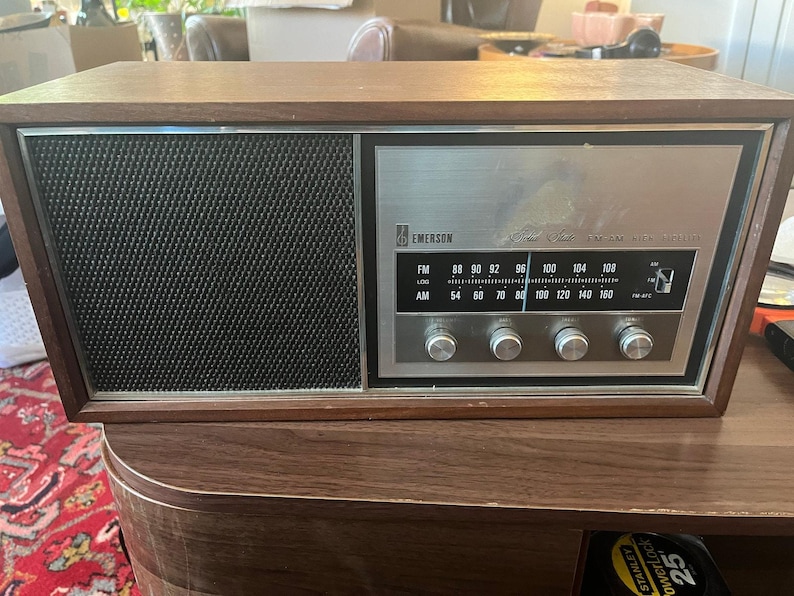 vintage Emerson Model 31T56 radio, a solid-state AM/FM tuner in a wood cab. image 1