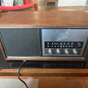 vintage Emerson Model 31T56 radio, a solid-state AM/FM tuner in a wood cab. image 8