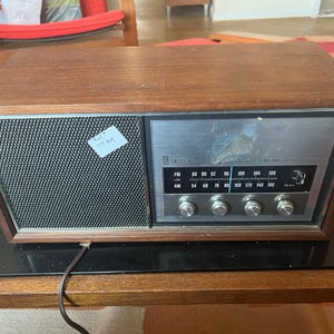vintage Emerson Model 31T56 radio, a solid-state AM/FM tuner in a wood cab. image 7
