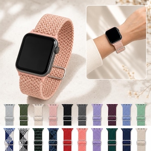 May include: A smartwatch with a black screen and a textured, braided pink nylon watch band featuring a silver-toned metal adjustable buckle. The image also displays a variety of other watch band colors and patterns in a grid layout below.