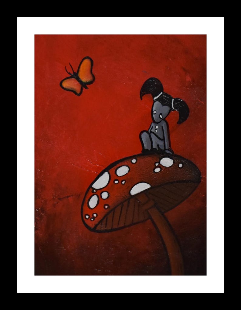 May include: A whimsical painting featuring a gray figure with black hair sitting on a red mushroom with white spots. An orange butterfly hovers nearby against a red background. The artwork is framed in white.