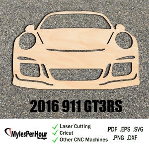 May include: A wood cutout of the front of a 2016 Porsche 911 GT3RS. The cutout is suitable for laser cutting, Cricut, and other CNC machines. The text "2016 911 GT3RS" is below the cutout.