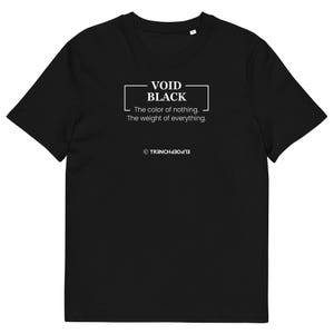 May include: Black t-shirt with white text that reads "VOID BLACK. The color of nothing. The weight of everything. © TRENCH430D13"