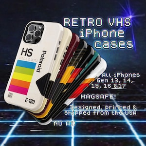 May include: A stack of retro VHS iPhone cases. The top case is white with a Polaroid design and a rainbow stripe. Other cases feature various designs. Text on the image reads "Retro VHS iPhone Cases" and "All iPhones Gen 13, 14, 15, 16 & 17".