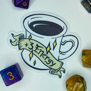 May include: A white coffee mug with a black coffee inside and a banner that says " +3 Energy" in yellow lettering. The mug is surrounded by five dice with gold and purple accents.