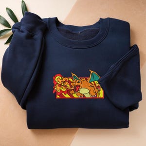 Embroidered Cartoon Sweatshirt, Pocket Monster Sweater, Fire Lizard Shirt, Flamethrower Inspired Design, Perfect Gifts for Cartoon Lovers