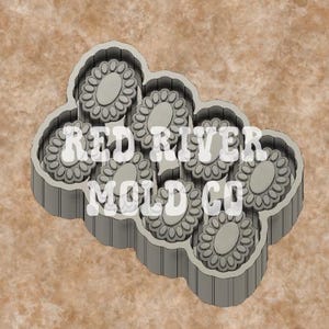 May include: A gray plastic mold with a floral design. The mold features multiple oval-shaped flowers with detailed petal patterns. The text "RED RIVER MOLD CO" is printed across the center of the mold.