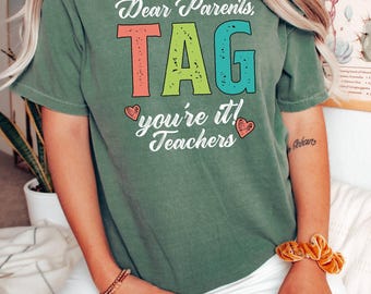 Camisetas de colores cómodos, camisetas con la etiqueta "Queridos padres", camisetas "Eres tú", camisetas "Amor de maestro", camisetas "Último día de clases", camisetas "Receso de maestros", camisetas de graduación