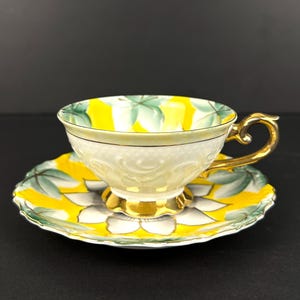 Hand-Painted Trimont China Occupied Japan teacup and Saucer With Bonus Dutch Girl Also Occupied Japan