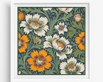 May include: A framed floral print featuring a repeating pattern of large white and orange flowers with green leaves against a dark teal background. The flowers have detailed petals and are arranged in a symmetrical design. The frame is white.