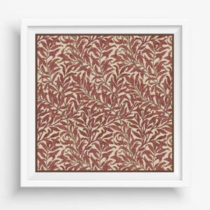 May include: Framed artwork featuring a repeating pattern of red leaves on a beige background. The leaves are detailed and arranged in a dense, organic design. The artwork is framed in a white square frame with a brown inner border, creating a classic and elegant look.