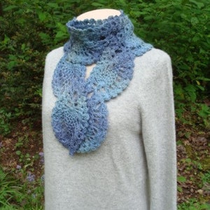A crochet pattern from Nancy Brown-Designer - a lovely scarf crocheted in a pineapple design. Soft, warm and cuddly pineapples cascading around the neck makes this beautiful scarf a fashion must-have.