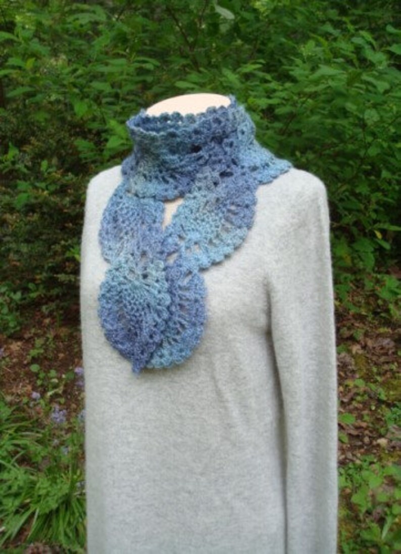 A crochet pattern from Nancy Brown-Designer - a lovely scarf crocheted in a pineapple design. Soft, warm and cuddly pineapples cascading around the neck makes this beautiful scarf a fashion must-have.