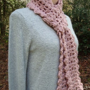 A crochet pattern from Nancy Brown-Designer - a pattern for a quick and easy winter scarf. So warm and cuddly, so quick and easy to make. Crocheted in a heavy worsted or aran weight yarn and the pattern stitch is easy enough for a novice.