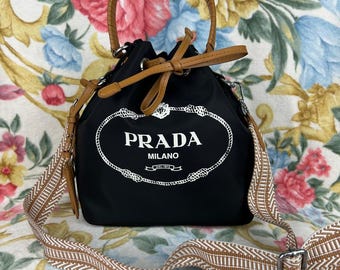 PRADA-draagtas met emmer.