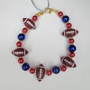 Handmade Beaded Blue And Red Football Bracelet in Gold