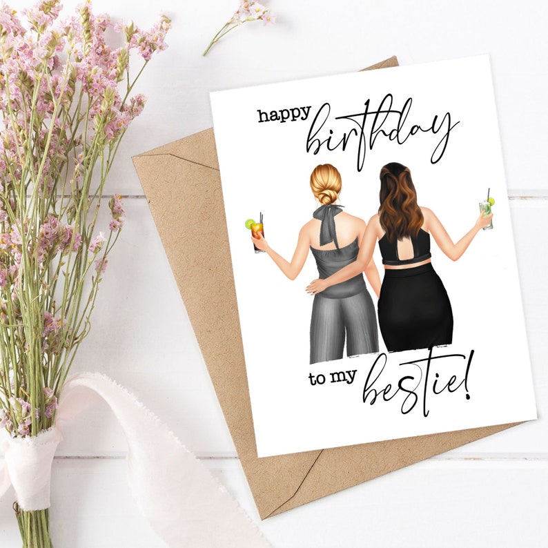 May include: A birthday card with the text "happy birthday to my bestie!" features two women holding cocktails. The card is on a brown envelope, with pink flowers and a white background.