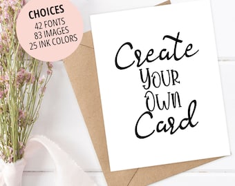 May include: A white greeting card with the black text Create YOUR OWN Card, placed on a brown envelope. A pink circular graphic displays the text CHOICES 42 FONTS 83 IMAGES 25 INK COLORS. The card is positioned next to a bouquet of dried pink flowers.