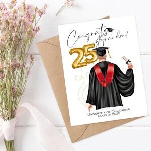 May include: A graduation card with the text "Congrats Brandon!" and a depiction of a graduate in a black robe with a red stole, holding a diploma. Gold number 25 balloons are featured. The card is paired with a brown envelope and flowers.