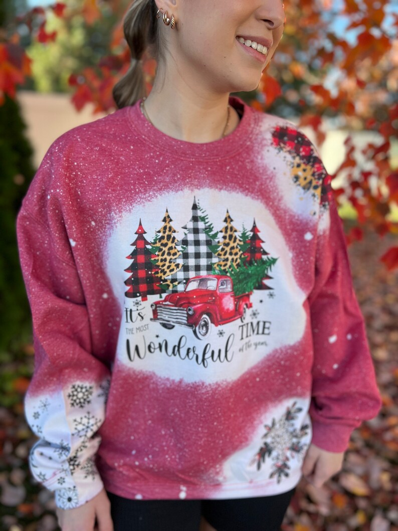 Bleached Vintage Christmas It's the Most Wonderful Time of the Year Sweatshirt with Red Truck Leopard and Plaid and Snowflake Sleeves image 1