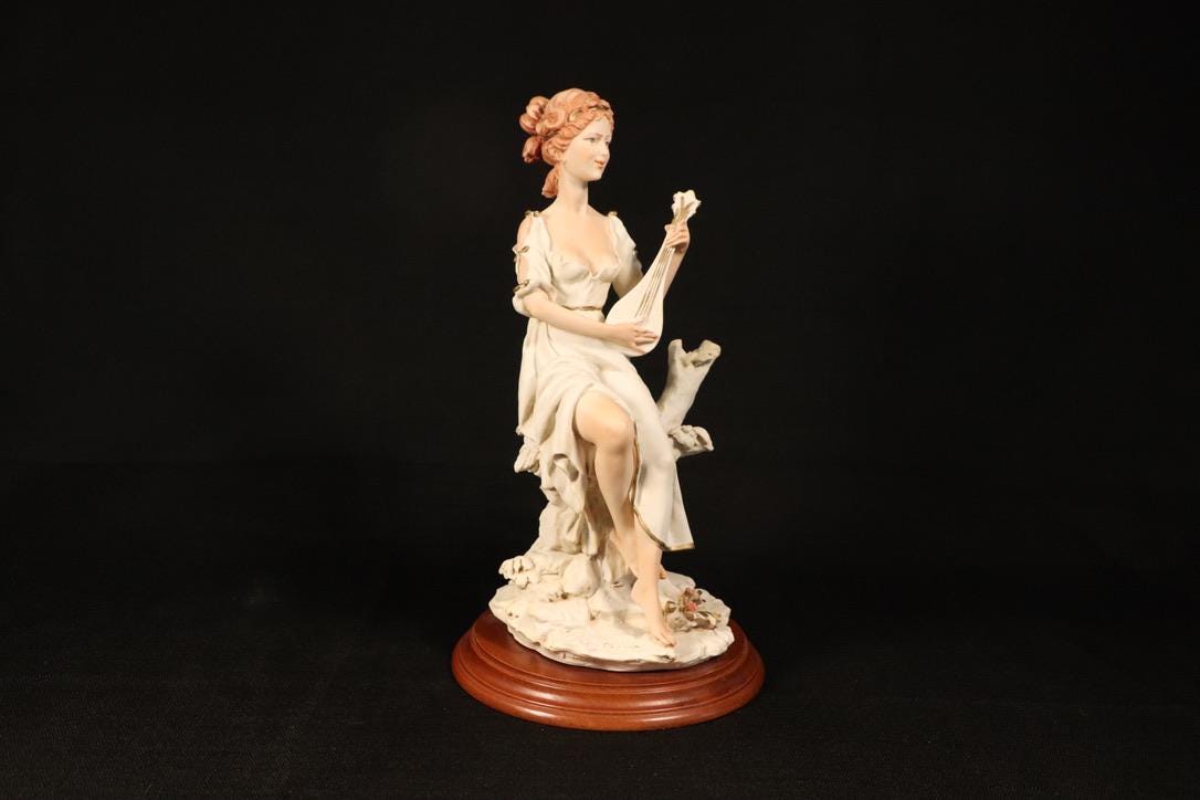 Auro Belcari - Etsy