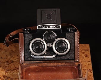 Cámara réflex estéreo de doble objetivo Sputnik soviética de la URSS, modelo GOMZ LOMO 120, película vintage.