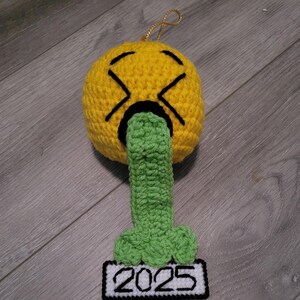 Ornament-2025 vomit. Or any year. Hand crocheted