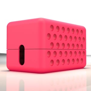 Puede incluir: Una caja rectangular de color rosa brillante con un pequeño agujero en la parte delantera y un patrón de pequeños círculos en la parte superior e inferior.