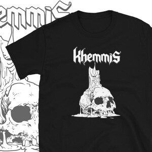 May include: Black t-shirt with a white skull graphic and the text "Khemmis" printed on the front.