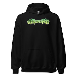 May include: Black hooded sweatshirt with a green and yellow gradient graphic of the word "Shreckerpeer" on the front.