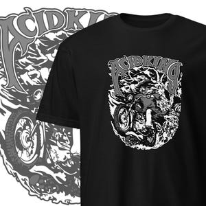 May include: Black t-shirt with a white graphic of a motorcycle rider with the text "Acid King" above the rider.