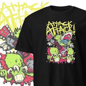 Puede incluir: Camiseta negra con un gráfico de un monstruo verde tocando una guitarra eléctrica roja. El monstruo tiene dientes afilados y alas. El texto "Attack Attack!" está escrito en amarillo y verde sobre el monstruo.