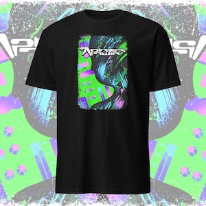 May include: Black t-shirt with a graphic print of a green, blue, and purple abstract design. The design includes the text "APIKSA" in white.