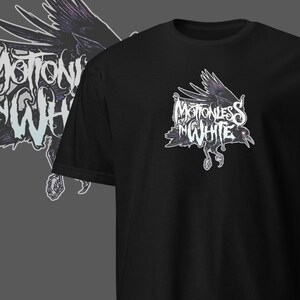 May include: Black t-shirt with a graphic of a crow with the text "Motionless In White" in white lettering.