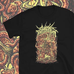 May include: Black t-shirt with a graphic print of a yellow and red monster with tentacles. The text "GATES OF DECADENCE" is printed in yellow above the monster.