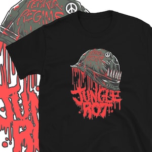 May include: Black t-shirt with a graphic of a military helmet with a peace sign on it. The helmet is dripping with red paint and the text "Jungle Rot" is written in red below it.