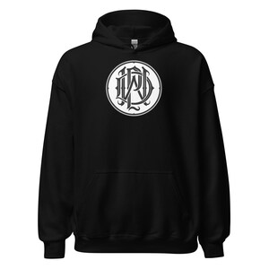 May include: Black hooded sweatshirt with a white circular logo featuring the letters "WPD" in a stylized font.