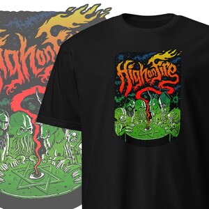 May include: Black t-shirt with a green, red, and yellow graphic of a band called "High on Fire". The graphic features a group of cartoon characters with a pentagram and an eye in the center.