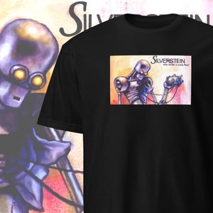 May include: Black t-shirt with a graphic of a robot holding a small object. The text "SILVERSSTEIN when broken is easily fixed" is printed on the graphic.