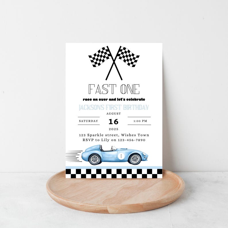 May include: A blue and white race car birthday party invitation with a checkered flag design. The invitation reads "Fast One" and "Jackson's First Birthday". The date is August 16, 2025, at 1:00 PM. The address is 123 Sparkle Street, Wishes Town. RSVP to Lily at 123-456-7890.
