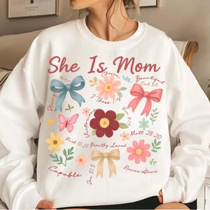 Christian Mom PNG | She Is Mom Bible Verse Design | Floral Bow Sublimation for Mother’s Day Shirt | Faith Mama Graphic