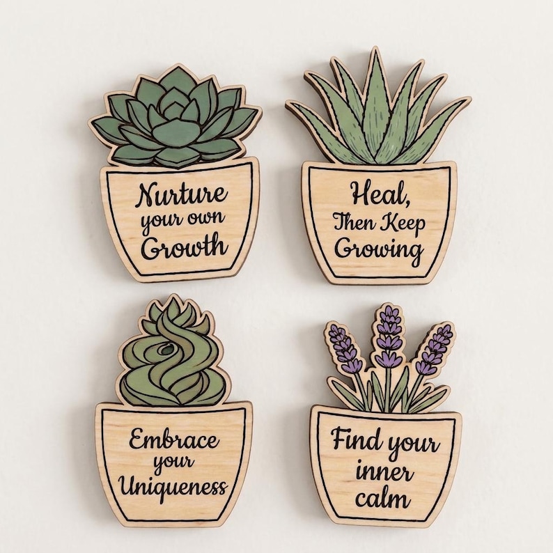 May include: Four wooden plant-themed cutouts featuring potted succulents and lavender. Each pot displays black text: Nurture your own Growth, Heal, Then Keep Growing, Embrace your Uniqueness, and Find your inner calm. The plants are green and purple.